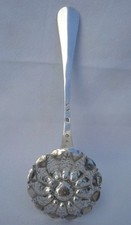 Cuillère à saupoudrer en