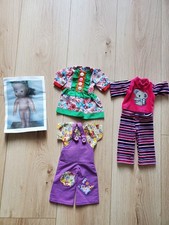 Lot vêtements pour poupée