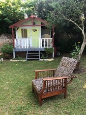 fauteuil Morris à repose pieds acajou et filet de bois de rose année 20