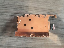 Panasonic Lumix DMC-TZ60, plaque metal entre l'objectif et l'écran LCD