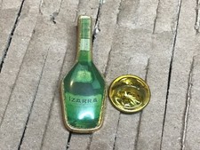 pins IZARRA verte signé SEGEDE PARIS. Liqueur distillat plantes 1906 HENDAYE