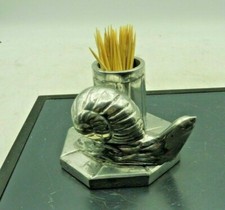 PORTE CURE DENTS ALUMINIUM