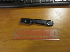 Règle et couteau découe