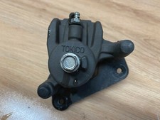 UN ETRIER DE FREIN ARRIERE MOTO KAWASAKI 650 ER-6F ER6 ER6F ABS 2012 A 2016