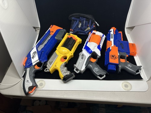 Nerf assorted blasters - assorted, and