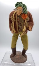 Santon  Simone JOUGLAS  27 cm  Signature  manuelle sous le socle Vendeur d’ail.