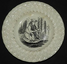Petite assiette ancienne XIXème - Fleurs en relief en bordure