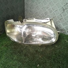 Optique avant principal droit (feux)(phare) FORD  ESCORT 5 1046870