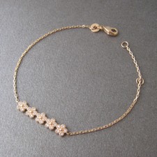 Bracelet fleurs serti de