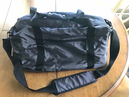 Gray duffel carry travel - on,