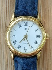 Montre LIP Quartz - Ø 2,2 Cm - Chiffres Romains Noirs - Bracelet Bleu Neuf 