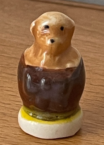 Adorable fève chien ours - ou,