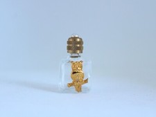 3.6 cm. Miniature de parfum vide, bouteille en verre transparente décor hibou