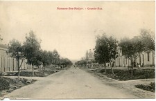 CARTE POSTALE / ALGERIE HAMMAM BOU HADJAR GRANDE RUE