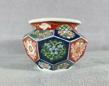 Ancien vase à facettes en