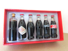 Coffret COCA-COLA. CONTOUR. 2010. Evolution de la Bouteille 1899/1961. COLLECTOR