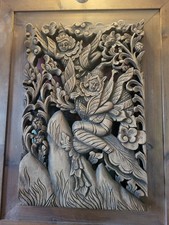 Panneau en bois sculpté