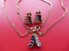 parure neuve plaqué or non poinçonnée véritables saphirs et zircons  5,37gr 