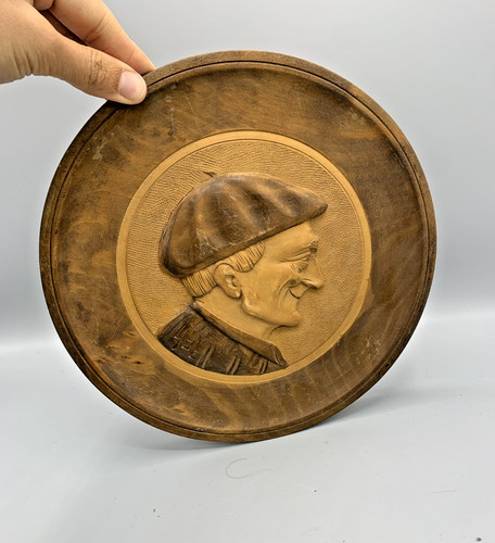 Médaillon bois sculpté