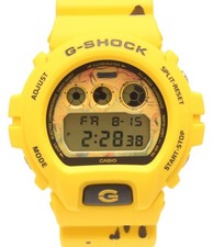 Montre à quartz jaune pour