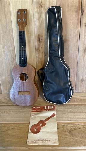 Ukulele with case and book - ukulele,