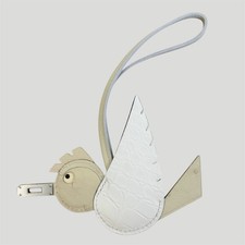 Charme de sac d'oiseau aile de