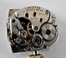 Montre Mouvement Longines dame carrée , mécanique,  numérotée,  aiguilles ok