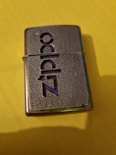 Zippo Briquet Essence ⛽️   . Logo Publicitaire.  Métal  . Occasion.  U.S.A