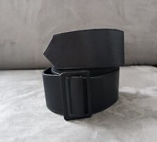 Ceinture large noire ajustable. 80 / 95 cm