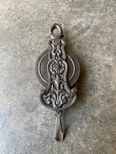 Ancienne poulie en fonte de