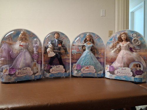 Dolls barbie the magic of - barbie,