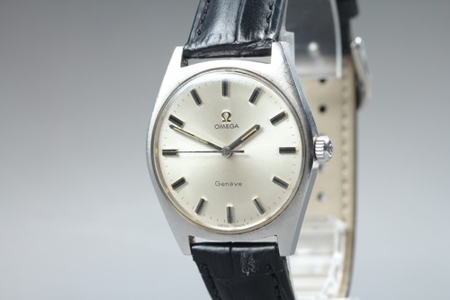 Presque comme neuve montre - *presque, neuve*