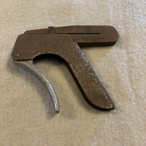 Ancienne pince perforatrice - ancienne, a