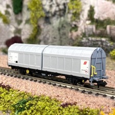 Wagon à parois coulissante