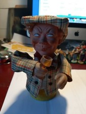 figurine le Buveur monté sur ressort ; le bras descend et remonte ; le jouet cou