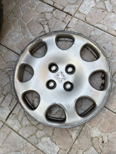 Enjoliveur quartz peugeot - 1,