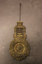 ancien balancier de pendule portique