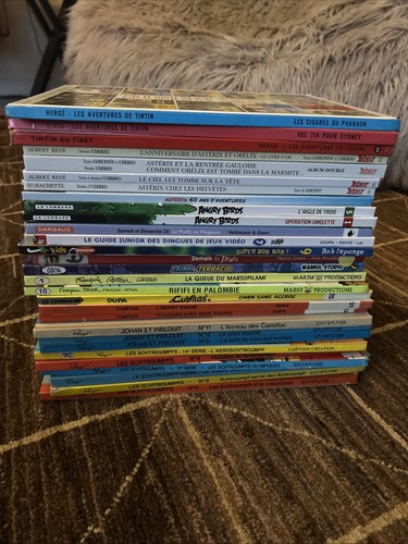 Lot astérix tintin - 29,