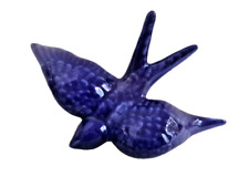 Hirondelle en céramique bleue