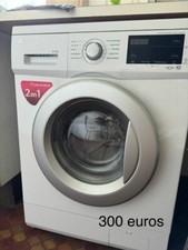 Lave-linge et sèche-linge LG blanc avec porte grise - 8/5 kg - 10 programmes