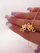 Collier masque de théâtre en