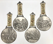4 vintage german metal decorative plates Mid-1900's representing the 4 seasons