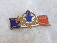 Un insigne militaire  " Force Française en Afrique du Nord " H 1314.