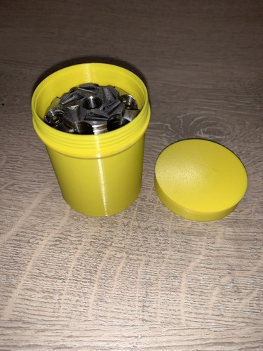 Boite jaune pour - , barillet