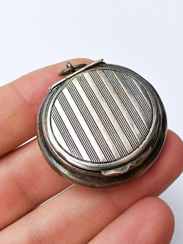 Boîte poudrier pendentif
