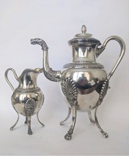 Deux pièces de service a  thé ou café en argent massif de style empire .