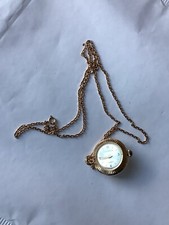 Ancienne montre pendentif mécanique, forme boule, LUMIERE S A vintage