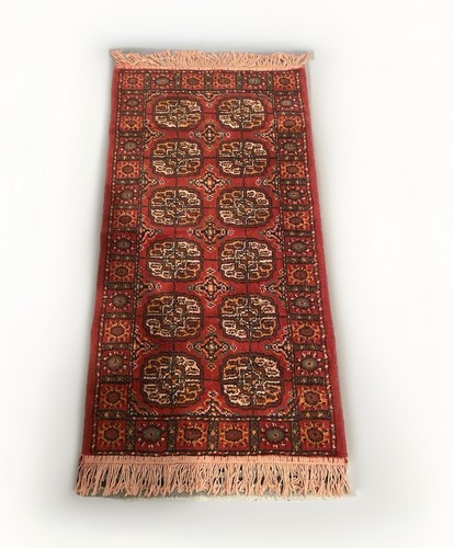 Ancien tapis fait - main,