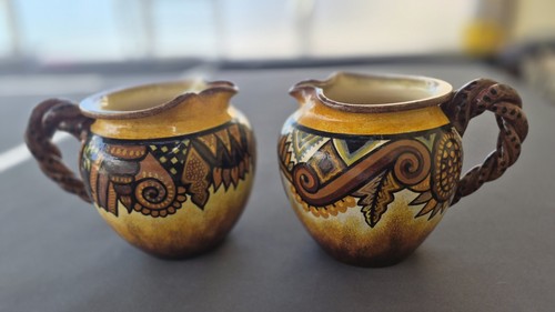 Rare paire pichets - de, faïence