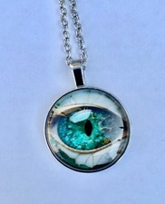 médaillon  argenté décor